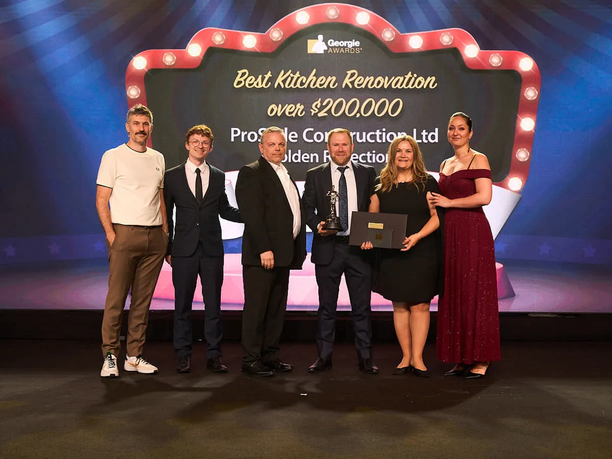 The ProStyle team on stage at the Georgie Awards, collecting the award for Best Kitchen Renovation over $200,000.